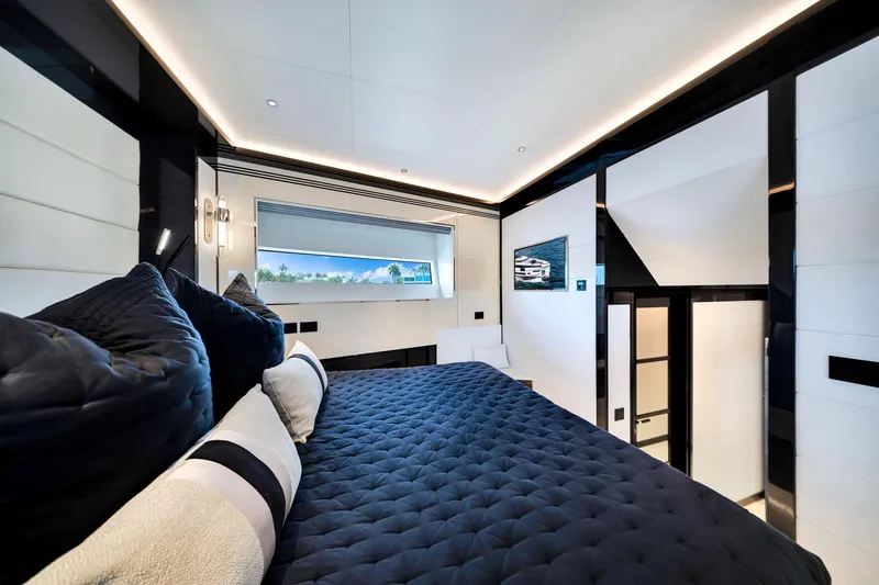  Yacht Photos Pics Luxurious interior of 2021 Sirena 88 yacht with elegant bedroom design.