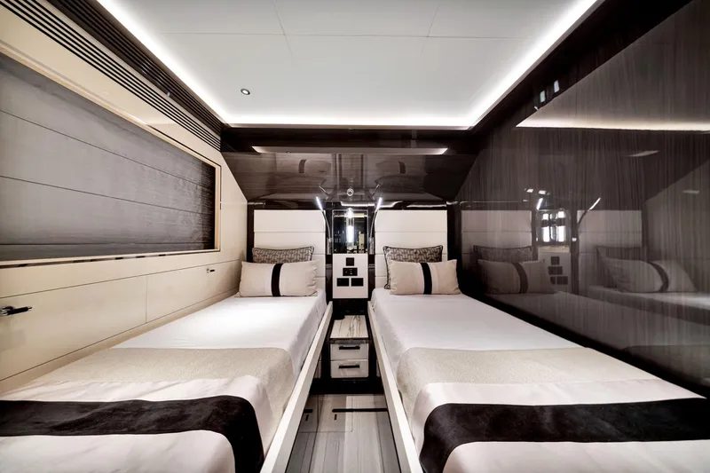  Yacht Photos Pics Luxurious twin bedroom interior on 2021 Sirena 88 yacht, featuring modern design and elegant decor.