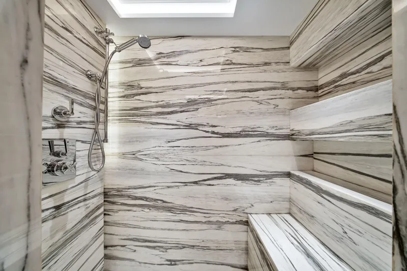  Yacht Photos Pics Luxurious marble shower interior in 2021 Sirena 88 yacht bathroom.