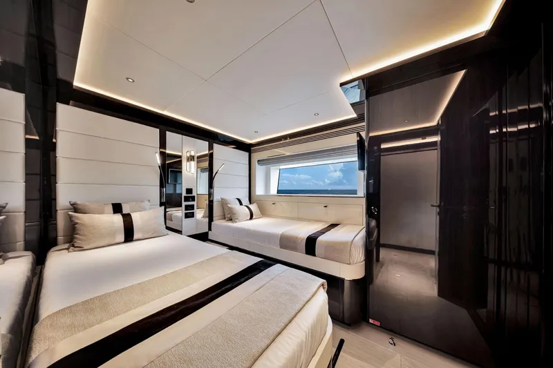  Yacht Photos Pics Luxurious interior of 2021 Sirena 88 yacht cabin with modern design and ocean view.