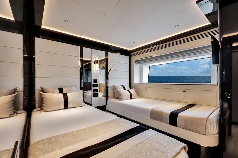  Yacht Photos Pics Luxurious interior of 2021 Sirena 88 yacht with ocean view through large window.