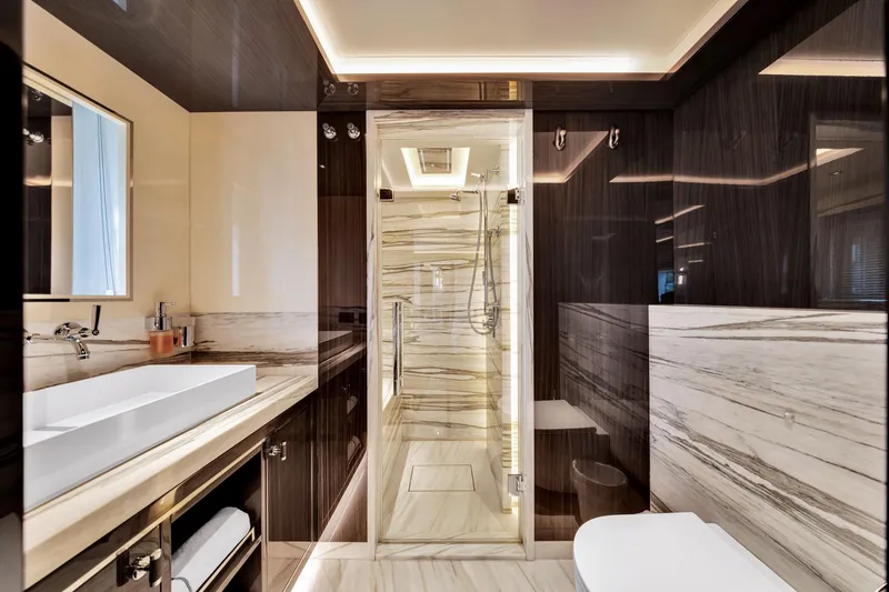 Yacht Photos Pics Luxurious bathroom interior on 2021 Sirena 88 yacht, featuring elegant marble and modern fixtures.