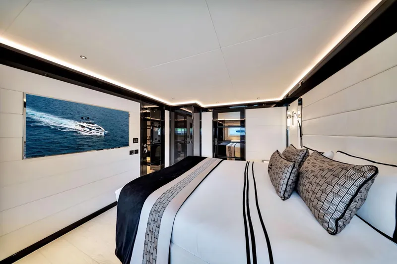  Yacht Photos Pics Luxurious interior of 2021 Sirena 88 yacht with elegant bedroom design.