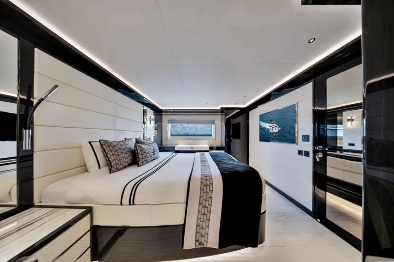  Yacht Photos Pics Luxurious bedroom interior on 2021 Sirena 88 yacht, featuring modern design and elegant decor.