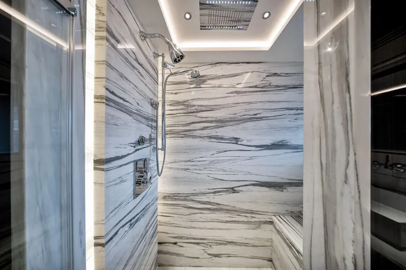  Yacht Photos Pics Luxurious marble shower interior on the 2021 Sirena 88 yacht.