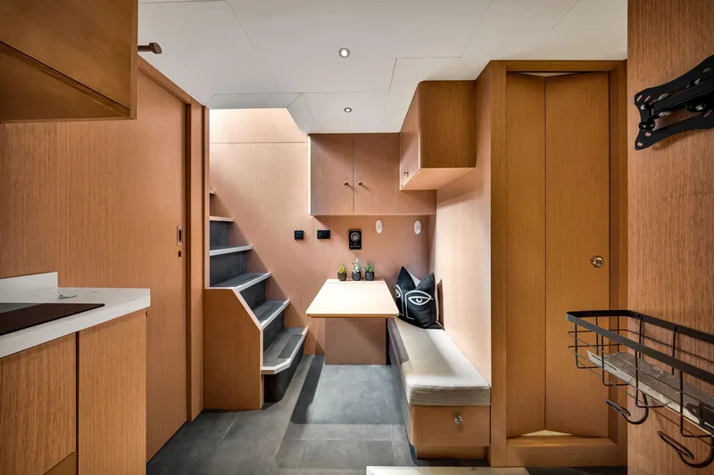  Yacht Photos Pics Modern interior of 2021 Sirena 88 yacht with wooden cabinetry and sleek design.