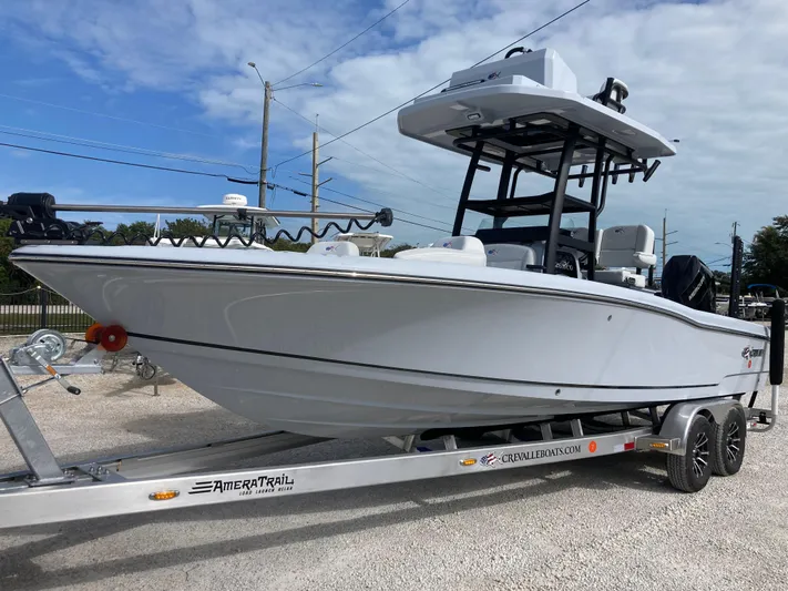  Yacht Photos Pics 2025 Crevalle 26HCO boat on trailer, sleek design, ready for adventure.