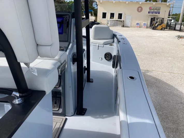  Yacht Photos Pics 2025 Crevalle 26HCO boat interior with seating and control panel.