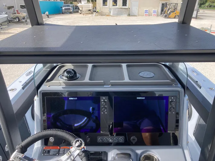 Yacht Photos Pics Helm of 2025 Crevalle 26HCO boat with dual Simrad displays.