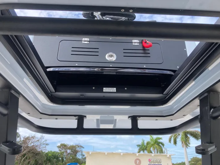  Yacht Photos Pics 2025 Crevalle 26HCO boat roof view with electronic equipment and clear sky.