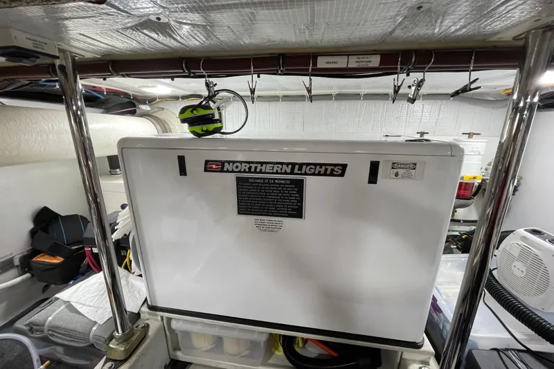 Pacific Rose Yacht Photos Pics Engine room of 2009 American Tug 49 Limited with Northern Lights generator.