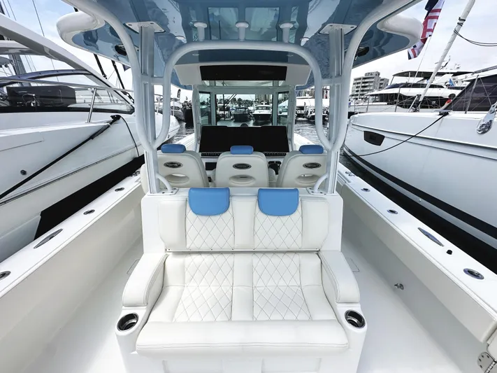 Triple J Yacht Photos Pics 2018 HCB 39 Speciale luxury boat interior with white seating and blue accents.