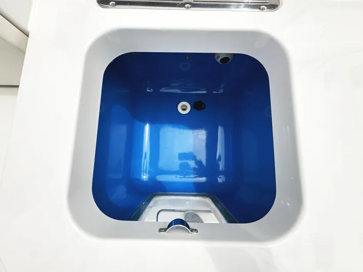 Triple J Yacht Photos Pics 2018 HCB 39 Speciale boat's blue livewell interior.