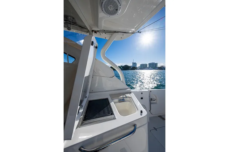  Yacht Photos Pics 2020 Pursuit DC 365 Dual Console boat with sink, grill, and ocean view.