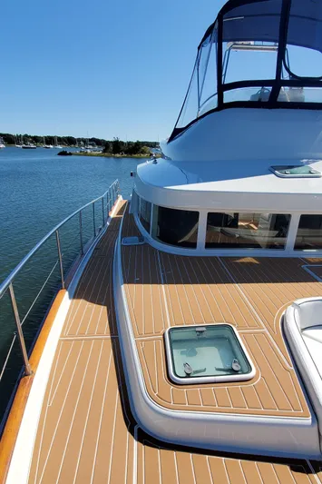 My Three Girls Yacht Photos Pics 2004 Lagoon 43 PC yacht with spacious deck and scenic water view.