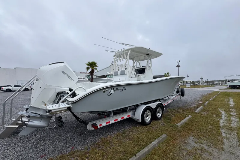  Yacht Photos Pics 2007 Yellowfin 31 Center Console boat on trailer, overcast day, parked outdoors.