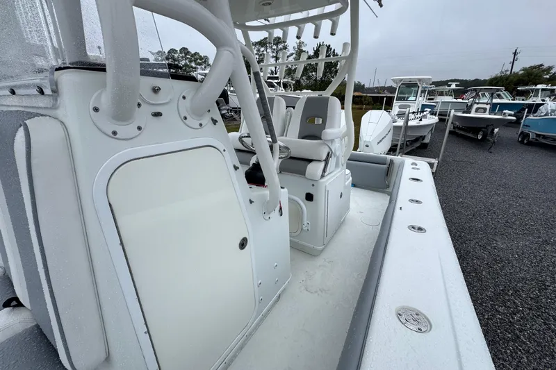  Yacht Photos Pics 2007 Yellowfin 31 Center Console boat interior with seating and storage compartments.