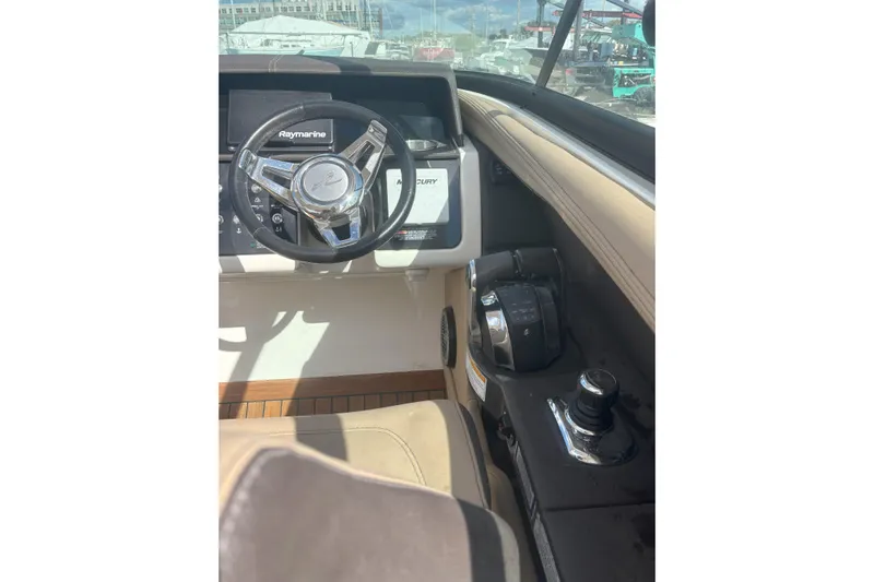  Yacht Photos Pics 2016 Sea Ray 350 SLX boat helm with Raymarine steering and control panel.