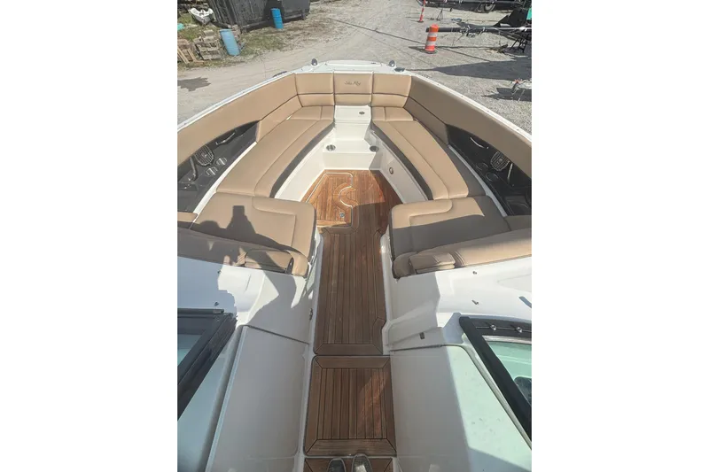  Yacht Photos Pics 2016 Sea Ray 350 SLX boat with tan seating and wooden deck.