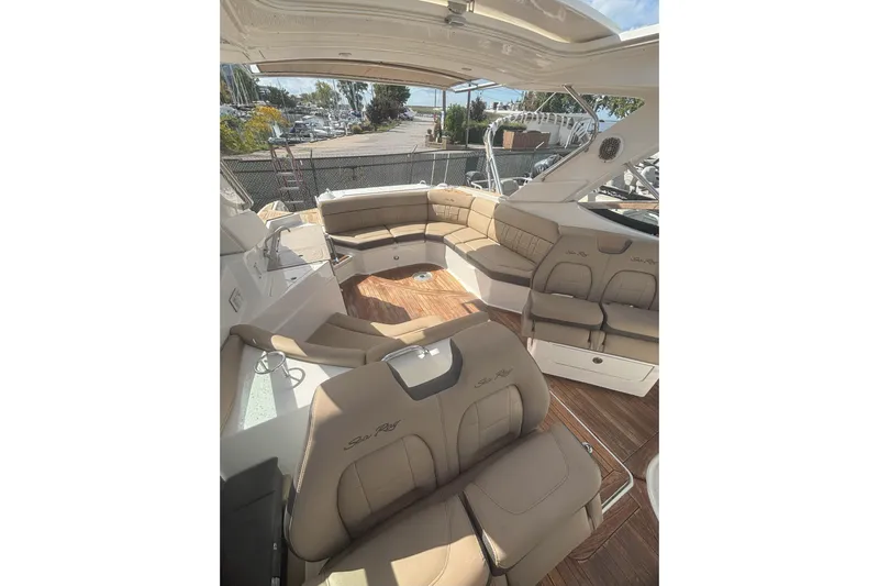  Yacht Photos Pics Luxurious interior of 2016 Sea Ray 350 SLX boat with spacious seating.