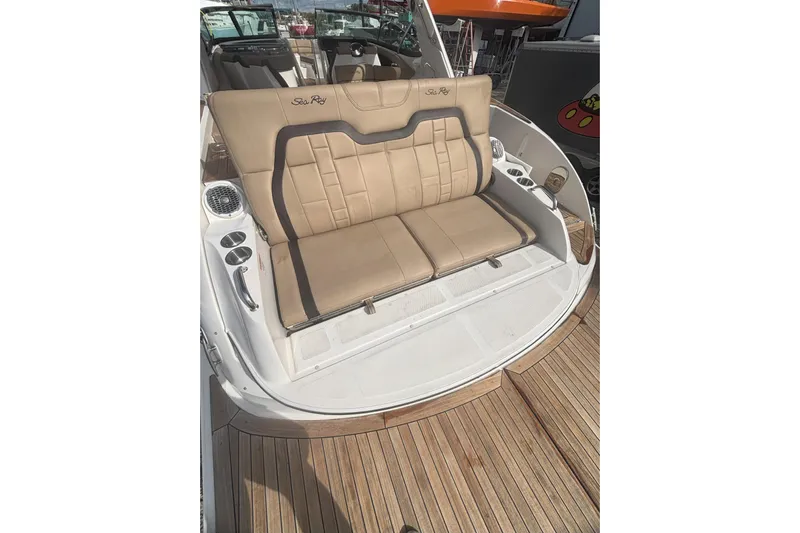  Yacht Photos Pics 2016 Sea Ray 350 SLX boat with tan leather seating and wooden deck.