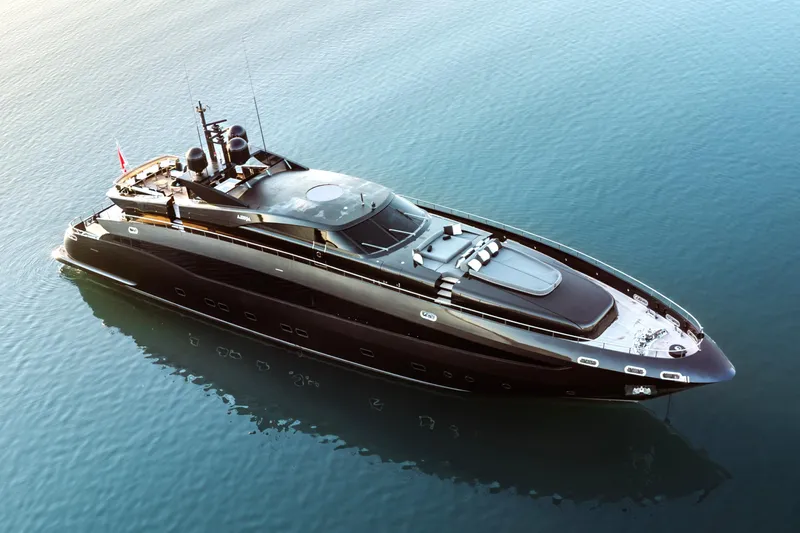 Aquila Yacht Photos Pics Luxurious 2004 Baglietto Custom yacht on calm blue waters.