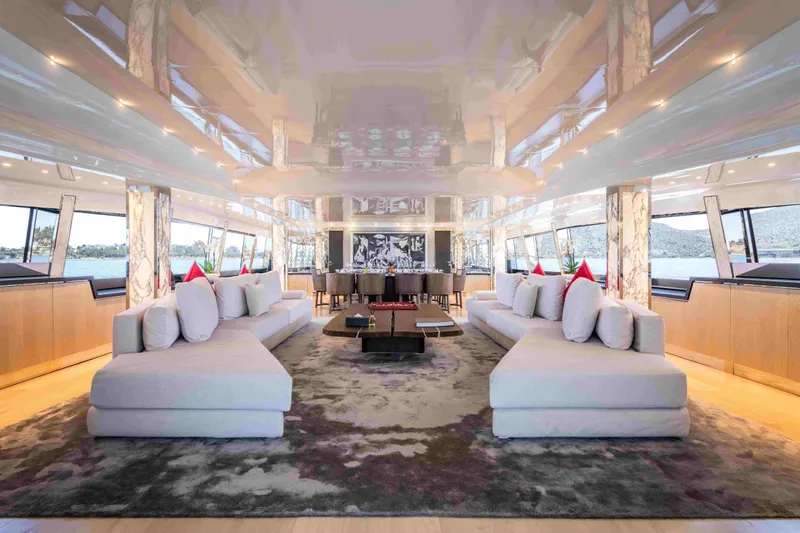 Aquila Yacht Photos Pics Luxurious interior of 2004 Baglietto Custom yacht with elegant seating and panoramic windows.