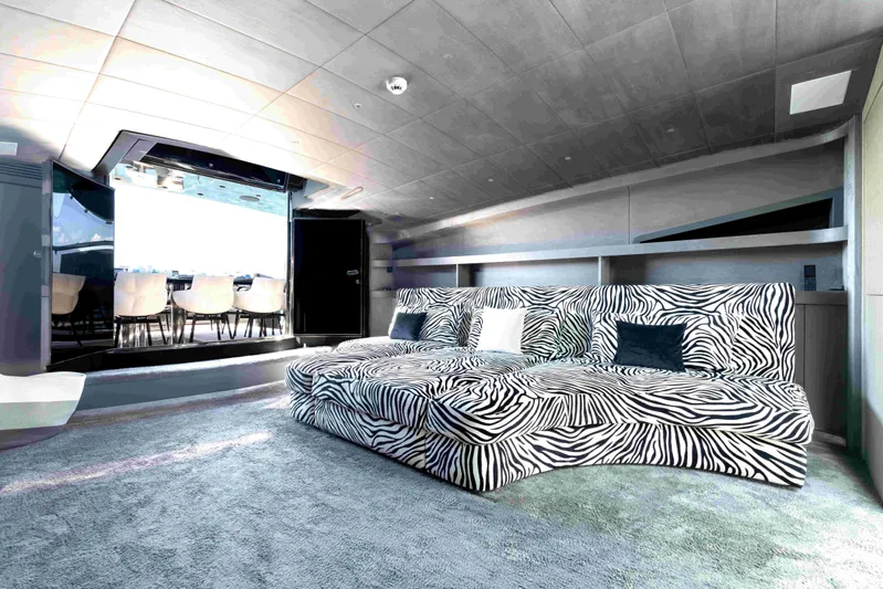 Aquila Yacht Photos Pics Luxurious 2004 Baglietto Custom yacht interior with zebra-patterned seating and modern design.