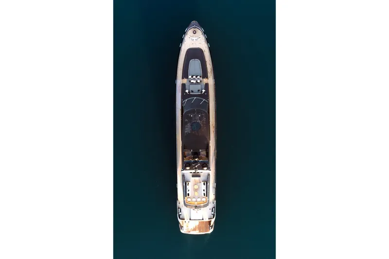 Aquila Yacht Photos Pics Aerial view of 2004 Baglietto Custom yacht on calm water.
