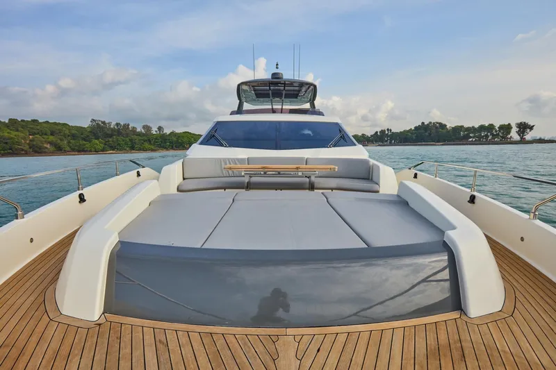  Yacht Photos Pics Luxurious 2018 Ferretti Yachts 850 on serene waters, featuring spacious deck and elegant design.
