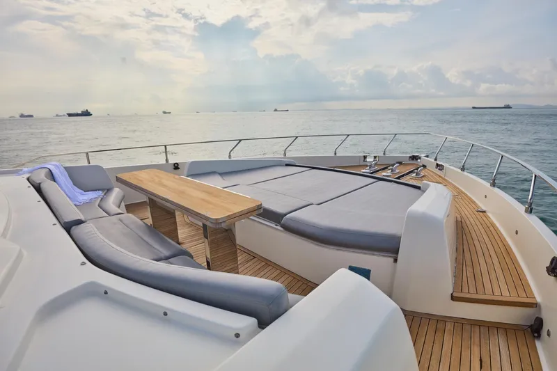  Yacht Photos Pics Luxurious 2018 Ferretti Yachts 850 deck with seating and ocean view.