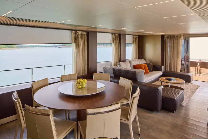  Yacht Photos Pics Luxurious interior of 2018 Ferretti Yachts 850 with elegant dining and seating area.