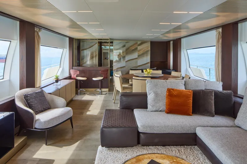  Yacht Photos Pics Luxurious interior of 2018 Ferretti Yachts 850 with modern furnishings and panoramic windows.