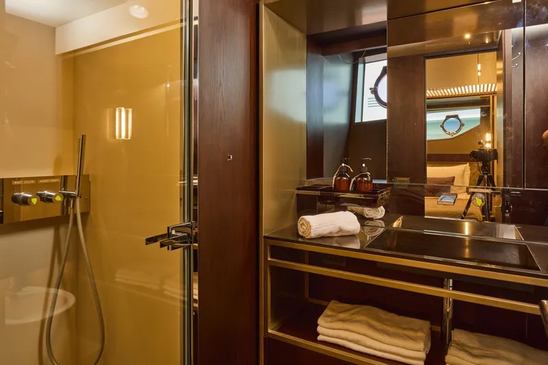  Yacht Photos Pics Luxurious bathroom interior of 2018 Ferretti Yachts 850, featuring modern fixtures and elegant design.