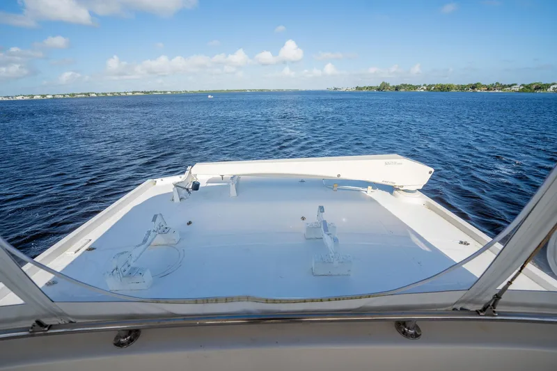 Jubilee Yacht Photos Pics 1989 Viking 63 Motor Yacht deck view with ocean and clear sky.