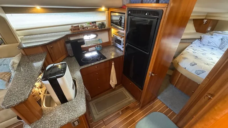 Jolly Roger Too Yacht Photos Pics 2004 Meridian 459 Galley port