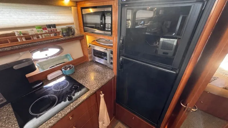 Jolly Roger Too Yacht Photos Pics 2004 Meridian 459 Galley