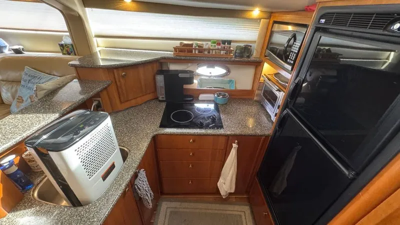 Jolly Roger Too Yacht Photos Pics 2004 Meridian 459 Galley port