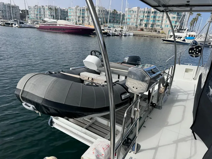La Vigie Yacht Photos Pics 2018 Lagoon 450 F yacht with dinghy docked in marina.