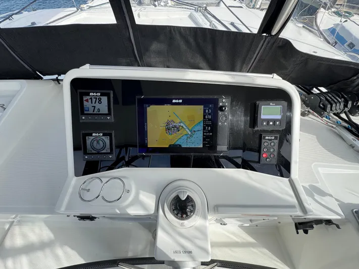La Vigie Yacht Photos Pics Helm of 2018 Lagoon 450 F catamaran with navigation instruments and controls.