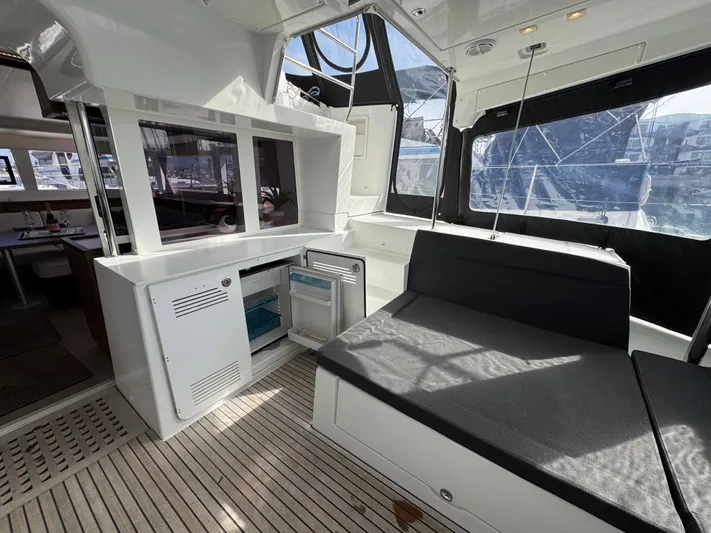 La Vigie Yacht Photos Pics Interior of 2018 Lagoon 450 F catamaran with seating and storage, featuring modern design.