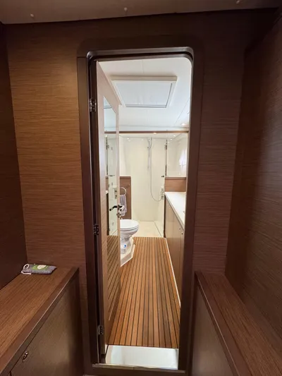 La Vigie Yacht Photos Pics Interior view of 2018 Lagoon 450 F yacht bathroom with wooden accents.