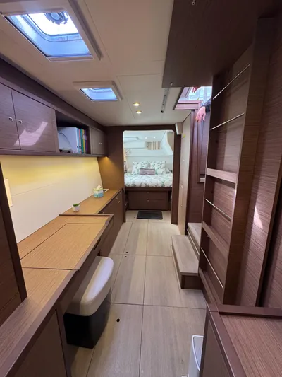 La Vigie Yacht Photos Pics Interior of 2018 Lagoon 450 F catamaran, featuring modern wood finishes and ample natural light.