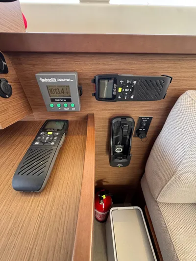 La Vigie Yacht Photos Pics Interior of 2018 Lagoon 450 F with navigation equipment and fire extinguisher.