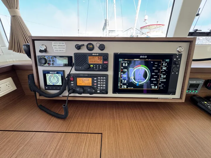 La Vigie Yacht Photos Pics Control panel of a 2018 Lagoon 450 F yacht with navigation and communication equipment.