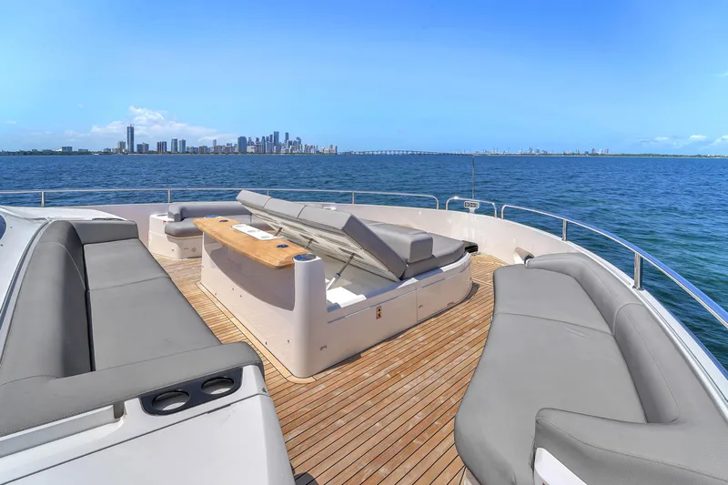 Worth The Wait Yacht Photos Pics Luxurious Sunseeker Ocean 182 yacht deck with city skyline view, 2024 model.