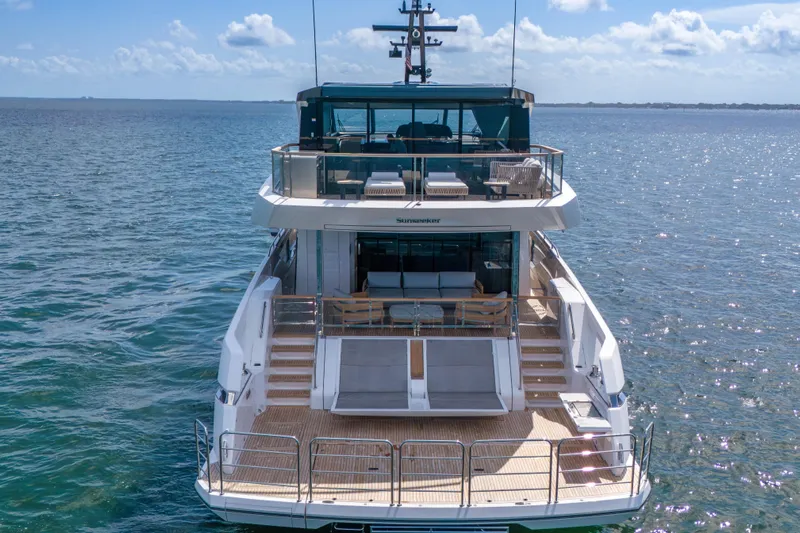 Worth The Wait Yacht Photos Pics 2024 Sunseeker Ocean 182 yacht on open water, showcasing luxurious deck and modern design.