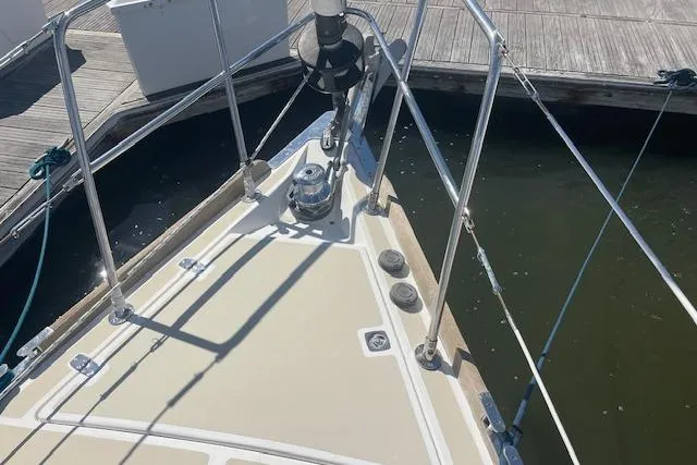 Aquavit Yacht Photos Pics Bow of 2001 Tartan 3700 sailboat docked at marina, featuring deck hardware.