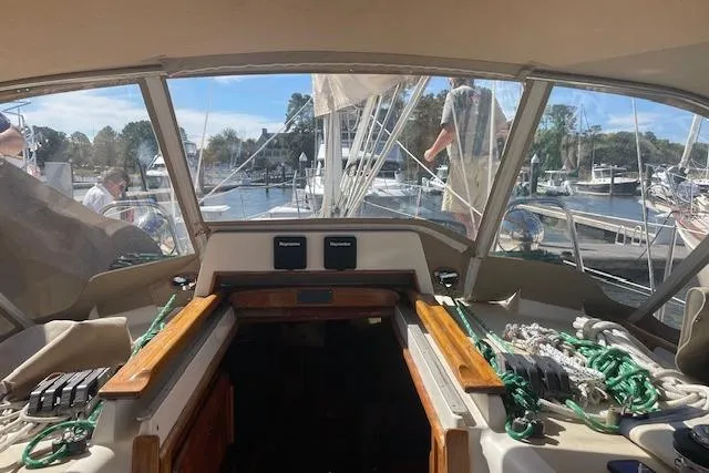 Aquavit Yacht Photos Pics Cockpit view of 2001 Tartan 3700 sailboat docked at marina.