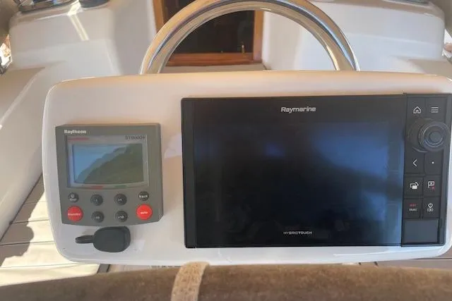 Aquavit Yacht Photos Pics Steering console of 2001 Tartan 3700 with Raymarine navigation system.